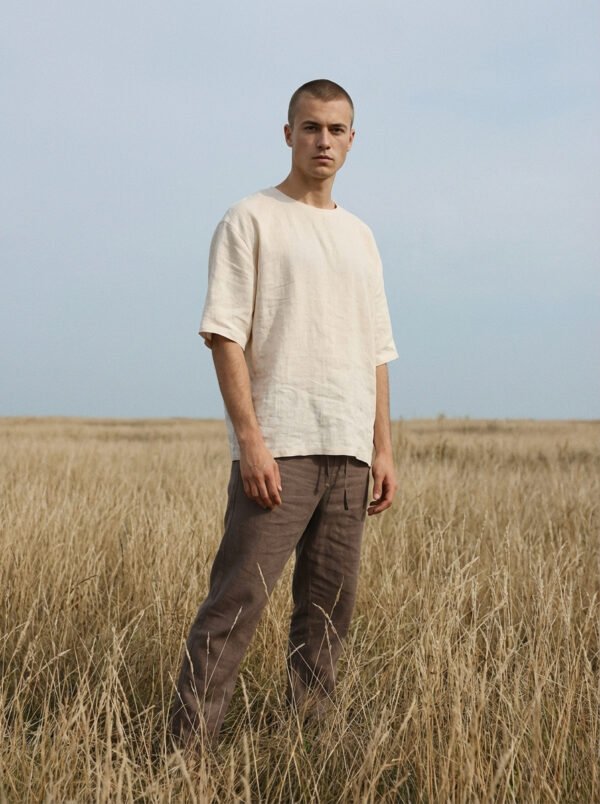 Minimalist linen t-shirt made from 100% natural pre-washed linen, featuring a relaxed fit, breathable lightweight fabric, and a soft, effortless silhouette suitable for everyday wear.