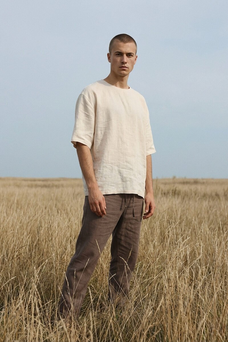 Minimalist linen t-shirt made from 100% natural pre-washed linen, featuring a relaxed fit, breathable lightweight fabric, and a soft, effortless silhouette suitable for everyday wear.